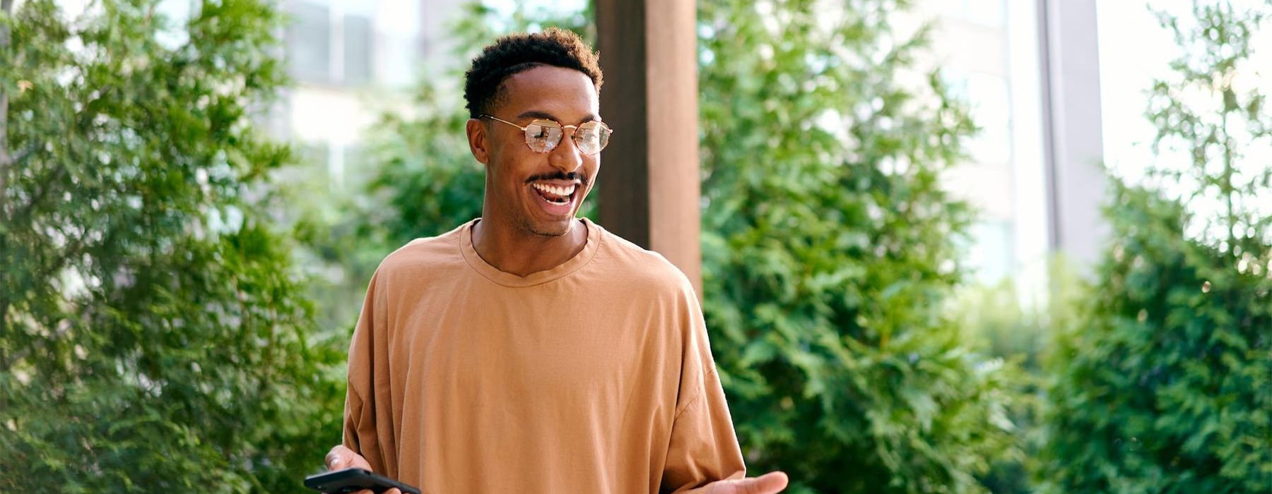 a man holding a phone