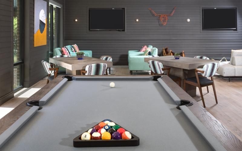 a pool table in a clubroom