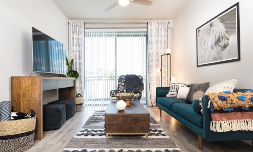 a living room with a tv and couch