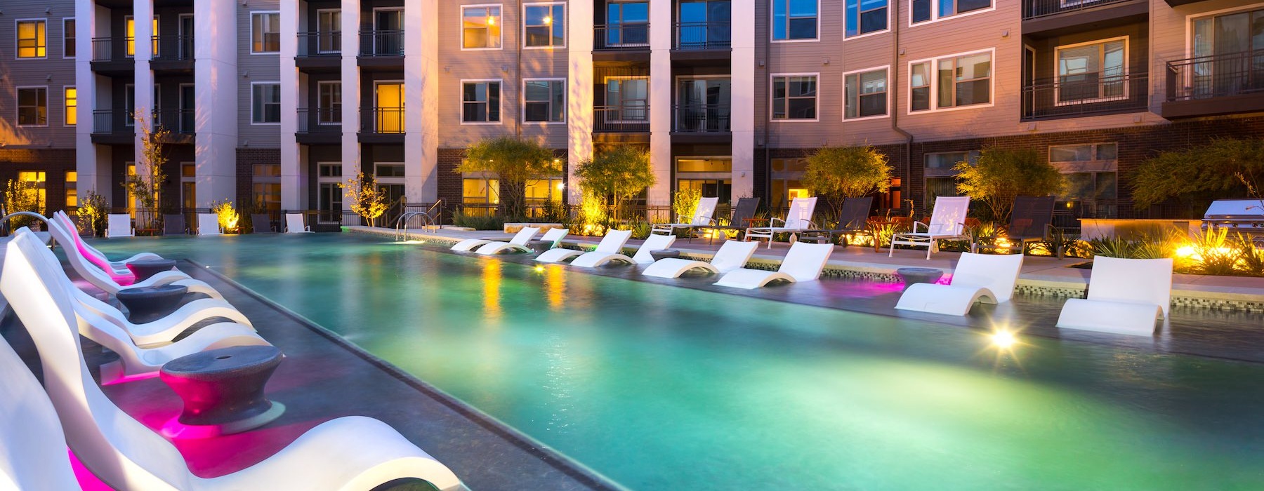 a pool in front of a building