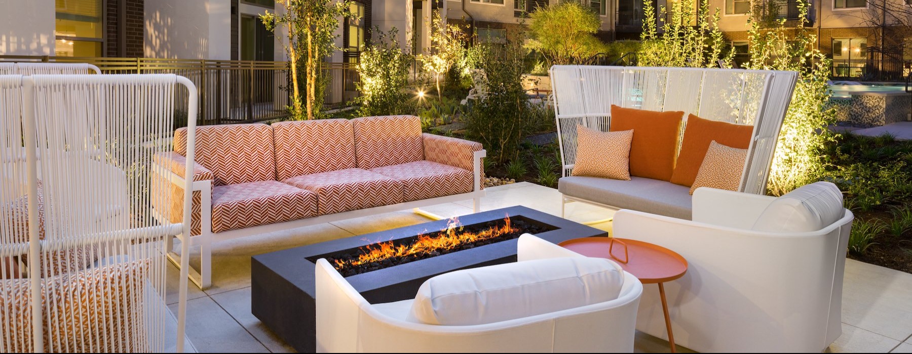 a fire pit with couches
